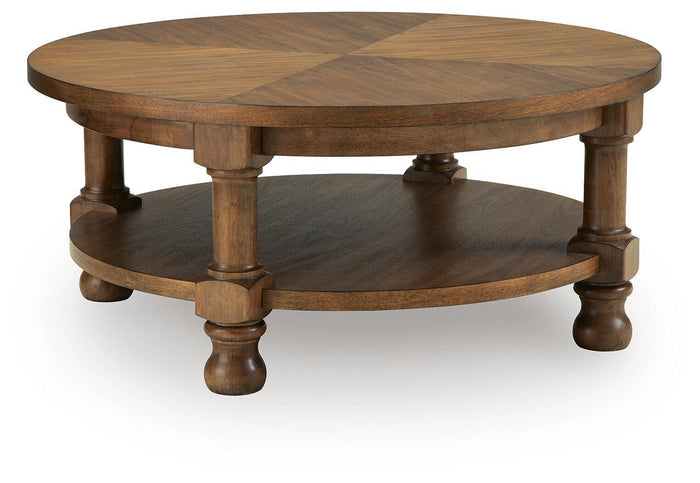 Chadworth - Round Cocktail Table - Medium Brown image 1