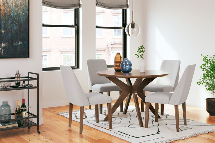 Lyncott - Dining Room Table Set in a styled room